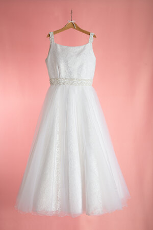 abito-da-comunione-in-pizzo-lavorato-coperto-da-toulle