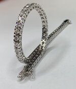 bracciale-a-tennis-con-diamanti-incastonati-a-griffe