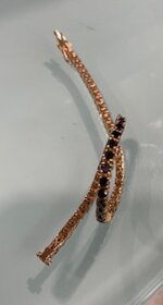 bracciale-tennis-in-oro-rosa-e-diamanti-neri