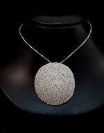 ciondolo-sole-in-trama-dargento