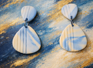 orecchini%20verde-arancio%20con%20scritta