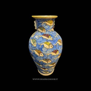 lavorato e dipinto a mano