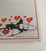 gatto-silvestro-lavagna-metallo