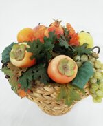 centrotavola-con-foglie-e-frutta