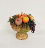 centrotavola-con-foglie-e-frutta