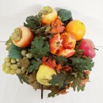 centrotavola-con-foglie-e-frutta