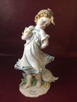 bambina-con-anatra-e-oca