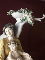 maternita-seduta-con-bimbo