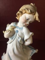 bambina-con-anatra-e-oca