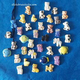 Animali misti in ceramica gatti, cani, gufi, orsetti, panda, elefanti e pesci