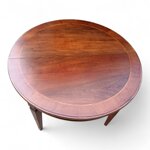 tavolo-artigianale-rotondo-allungabile-con-gamba-intagliata