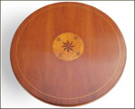 elegante-tavolo-rotondo-con-piano-intarsiato