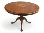 elegante-tavolo-rotondo-con-piano-intarsiato