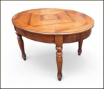 tavolo-ovale-allungabile-con-prolunghe-interne-e-piano-intarsiato