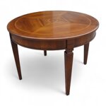 tavolo-rotondo-con-gamba-scanalata-apribile