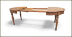 tavolo-ovale-allungabile-con-prolunghe-interne-e-piano-intarsiato