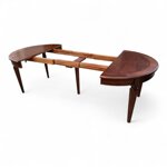 tavolo-artigianale-rotondo-allungabile-con-gamba-intagliata