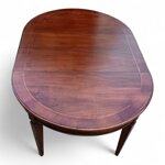 tavolo-artigianale-rotondo-allungabile-con-gamba-intagliata