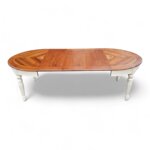 tavolo-ovale-allungabile-intarsiato-in-noce-con-base-panna-anticata