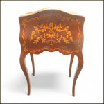 ribaltina-intarsiata-con-gambe-mosse