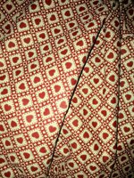 panama-di-cotone-tirolese-h-140-cm-rosso-bordeaux-a-cuori