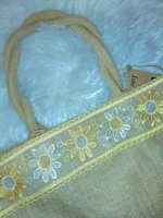 passamaneria-a-metraggio-macrame-h7-cm-naturale-con-girasole