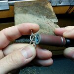 pendente-massonico-raffigurante-il-simbolo-del-nodo-damore-in-argento