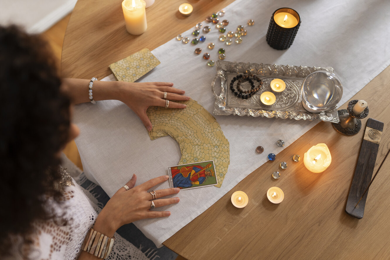 high-angle-woman-reading-tarot.jpeg high-angle-woman-reading-tarot.jpeg