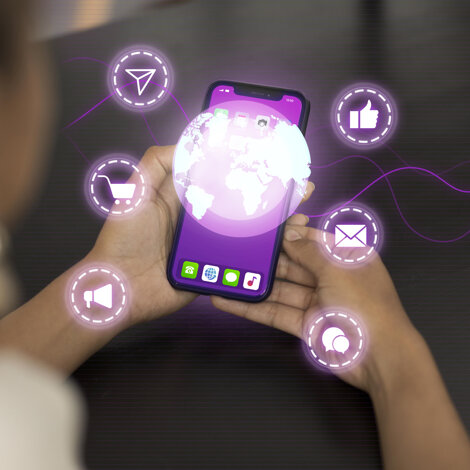 hand-holding-smartphone-social-media-concept.jpeg