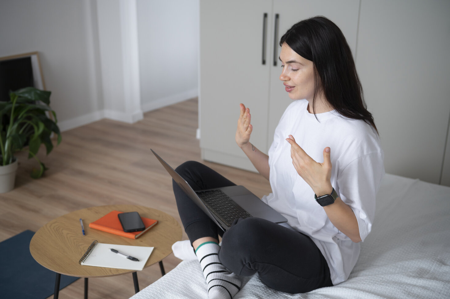 woman-talking-using-her-laptop-home-quarantine.jpeg