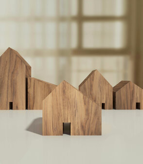 wooden-house-model-housing-real-estate-concept.jpeg