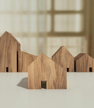 wooden-house-model-housing-real-estate-concept.jpeg