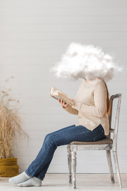side-view-woman-reading-chair.jpeg