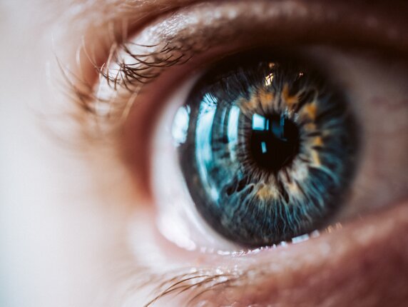 extreme-closeup-enlarged-human-eye-with-beautiful-colors.jpeg