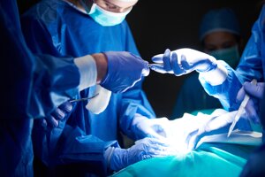surgeons-passing-scissors-each-other.jpeg