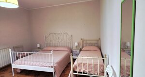 Camera da letto matrimoniale con soppalco in legno al B&B Dolce Dormire