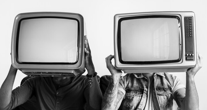people-holding-retro-television-each-other.jpeg