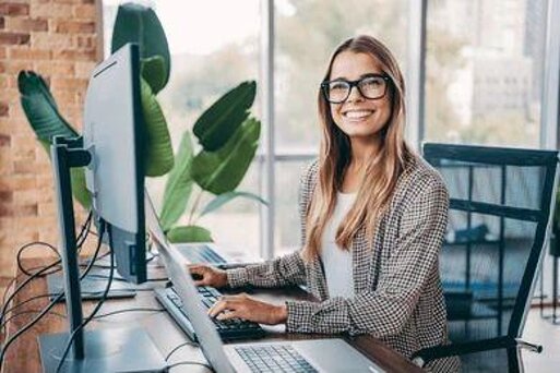 smiling-businesswoman-types-computer-bright-260nw-2751991727.jpeg smiling-businesswoman-types-computer-bright-260nw-2751991727.jpeg