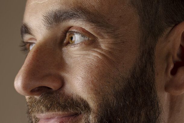 side-view-smiley-man-with-beard.jpeg