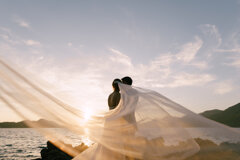 couple-celebrate-wedding-on-rocky-shoreline-at-sun-2026-09-23-01-57-15-utc.jpeg