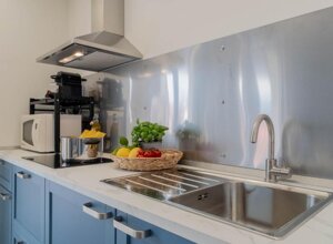 Fully equipped kitchen at Lakeview Attico Saini