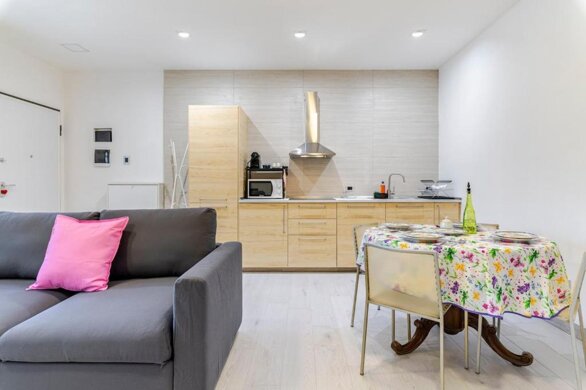 Living room and fully equipped kitchen at Bovisa Hub 97 - Politecnico in Milan Living room and fully equipped kitchen at Bovisa Hub 97 - Politecnico in Milan