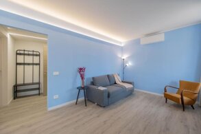 Bright bedroom at Lakeview Attico Saini in Stresa Bright bedroom at Lakeview Attico Saini in Stresa