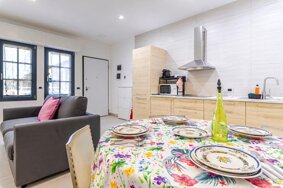 Dining area and kitchen at Bovisa Hub 97 in Milan