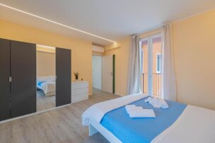 Bedroom at Lakeview Attico Saini in Stresa