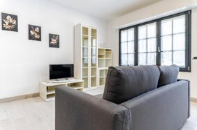 Sofa and living room at Bovisa Hub 97 in Milan