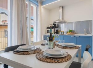 Living and dining area at Lakeview Attico Saini