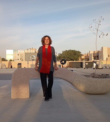 Emanuela Camacci with the stone sculpture R_esistere. Riyadh, Saudi Arabia Emanuela Camacci with the stone sculpture R_esistere. Riyadh, Saudi Arabia