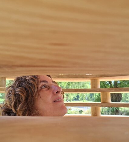 Emanuela Camacci inside the artwork Space-time capsule in Darmstadt forest trail. Germany