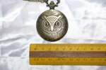 antico-orologio-da-tasca-con-gufo-quartz